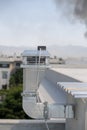 Galvanized air chimney outlet and electricity Royalty Free Stock Photo