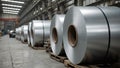 Galvanized sheet metal rolls on pallets in industrial factory setting Royalty Free Stock Photo