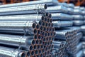 galvanized steel pipes stacked in warehouse Royalty Free Stock Photo