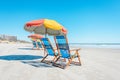 Colorful beach chairs and umbrellas on Galveston Island Texas.