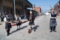 Galveston, TX/USA - 12 06 2014: Men dressed as Scottish musicians play harp at Dickens on the Strand Festival in Galveston, TX Royalty Free Stock Photo