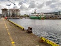 Galway city, Ireland - 09/24/2020: Galway docks area, Celtic explorer research vessel and Bonham quay construction site. Cloudy
