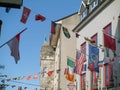 07/03/2019 Galway city, Ireland. International countries flags hanging over Shop street