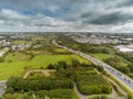 07/31/2019 Galway city, Ireland. Traffic jam on N6 road to town center. Aerial view. Cloudy day