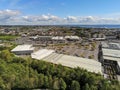 Galway, Ireland - 04/27/2020: Aerial view, Galway Shopping center during COVID 19 pandemic lock down. Warm sunny day, cloudy sky