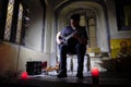 GALWAY, IRELAND - August 21 2019: a typical folk singer plays the guitar during a concert in an old church