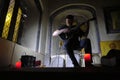 GALWAY, IRELAND - August 21 2019: a typical folk singer plays the guitar during a concert in an old church