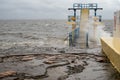 Galway - Ireland 02/28/2020: Blackrock public diving board hit by powerful waves before storm Jorge. Salthill