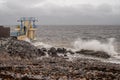 Galway - Ireland 02/28/2020: Blackrock public diving board hit by powerful waves before storm Jorge. Salthill