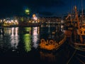 Galway - Ireland / 10/08/2020: Commercial ships in Galway Harbor illuminated at night