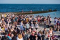 Galway, Ireland - 24.04.2021: Huge party on Salthill beach . Young people enjoy hot sunny weather with cold beer and cider. Fun