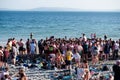 Galway, Ireland - 24.04.2021: Huge party on Salthill beach . Young people enjoy hot sunny weather with cold beer and cider. Fun