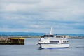 Galway, Ireland. 07.2022: SAOIRSE NA FARRAIGE ferry boat to Aran islands returning to port. Transportation and tourist industry