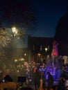 Galway, Ireland -29.10.2023: Scene at Macnas Halloween parade at Salmon Weir Bridge, Cathedral building in the background. Royalty Free Stock Photo