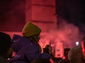 Galway, Ireland -29.10.2023: Scene at Macnas Halloween parade at Salmon Weir Bridge, Teenager girl watching the show