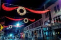 Galway / Ireland - 21/11/2020: Street lights and Christmas decoration in town center. Closed shops and pubs. Night scene