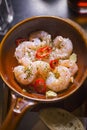 Gambas al Ajillo. Prawns cooked in Virgin Oil with Garlic and Chilli Royalty Free Stock Photo