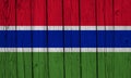 Gambia Flag Over Wood Planks