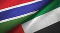 Gambia and United Arab Emirates two flags textile cloth, fabric texture