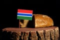 Gambian flag on a stump with bread