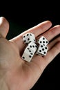 Gambler five dices in human hand Royalty Free Stock Photo