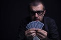 Gambler man holding cards Royalty Free Stock Photo