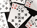 gambling card game. cards tens nines black and red diamonds worms clubs and spades on a dark background Royalty Free Stock Photo