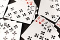 gambling card game. cards tens nines black and red diamonds worms clubs and spades on a dark background Royalty Free Stock Photo