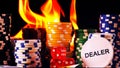 Gambling Poker Cards Money Chips and Red Dices on Fire Royalty Free Stock Photo