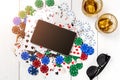 Gambling. Poker chips, cards and the dice nearby tablet on wooden table. Top view. Copyspace. Poker Royalty Free Stock Photo