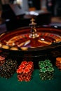 Gambling table and roulette wheel in casino. Royalty Free Stock Photo