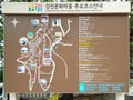 Poster with informative tourist map of the colorful Gamcheon culture village in Busan