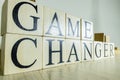 Game changer text on wooden cube blocks. Close up