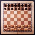 A game of chess, the beginning of a chess game two sides opposite each other. Royalty Free Stock Photo
