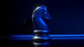 Game concept. Dark marble chess knight. Blue neon light. 3d illustration