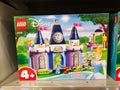 Game constructor LEGO Disney Princess Royal feast of Ariel Aurora and Tiana in a shopping mall on a shelf in the children`s toy