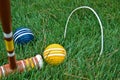 Croquet mallet and ball in grass Royalty Free Stock Photo
