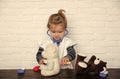 Game, development, imagination. Child veterinarian cure toy animals with vaccine