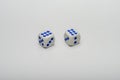 Game dice on which a combination of two sixes fell on a white background Royalty Free Stock Photo