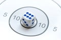 Game die showing six in the middle of a round shooting target, 6, 10, bullseye, good, perfect aim, goal achieving, winning, luck,