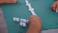 Game of Domino`s being played by men
