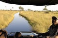 Game Drive in the flooded Okavango-Delta-swamps with the Jao Wilderness Game Ranger Royalty Free Stock Photo