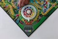 Game of Life by Hasbro with all a persons hand and game piece on the college graduation spot Royalty Free Stock Photo