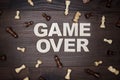 Game over concept on wooden background