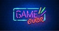 Game Over. Neon Text Sign with a Brick Wall Background. Vector illustration.