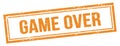 GAME OVER text on orange grungy vintage stamp