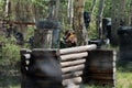 Players playing in the forest. Game in a paintball. Royalty Free Stock Photo