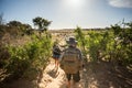 Trackers looking for poachers in the bush.