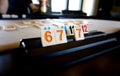 Game of rummy in progress showing large blocks with colorful numbers. Royalty Free Stock Photo