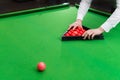 Game snooker billiards, athlete kick cue close up